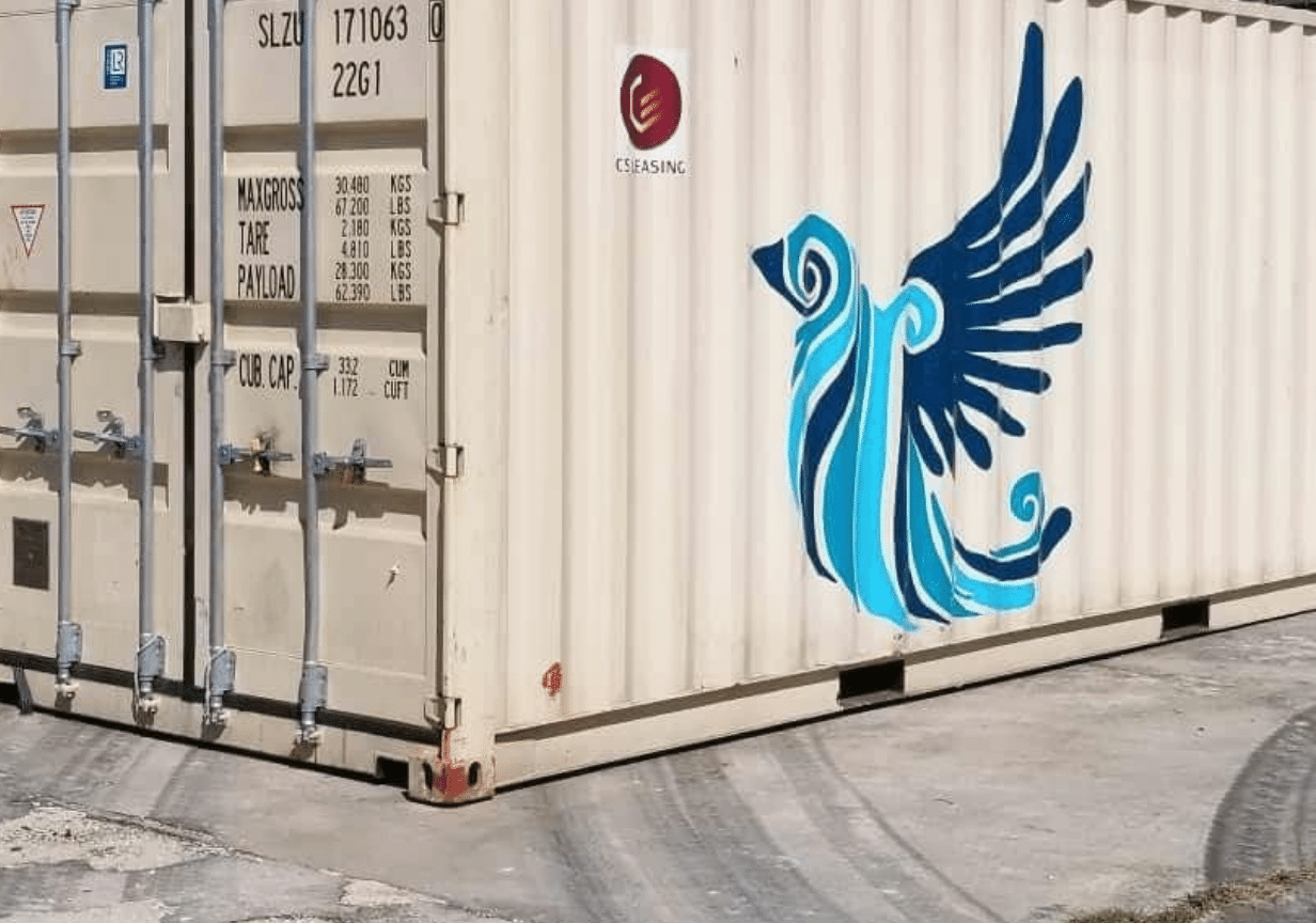 An image of a shipping container with the Anglican Missions logo, symbolising projects and what we do